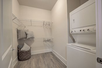 A laundry room with a washer and dryer.